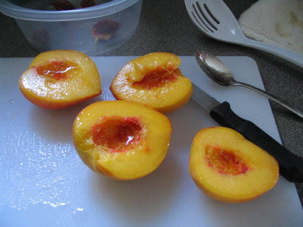 Peaches cut in half